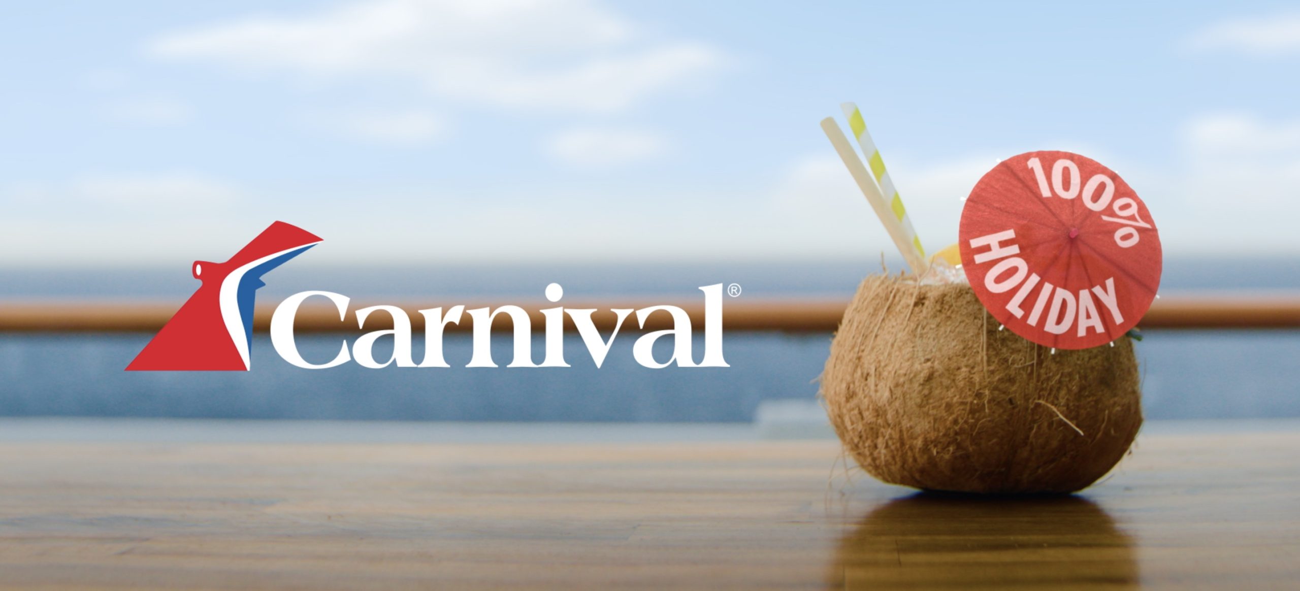 carnival cruise logo and tagline with coconut drink